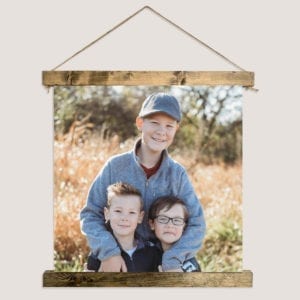 Hanging custom canvas photo print with wood frame designed by JKCC custom printing and design shop in Paola Kansas