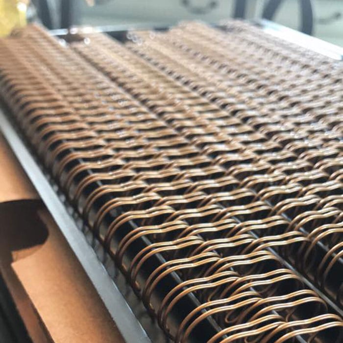Books with spiral binding designed and printed at JKCC custom printing and design shop in Paola Kansas